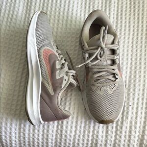 Nike Gray and Pink Athletic Shoes with Streamlined Design
